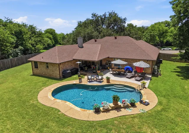 Photo 2 of Single family home for sale at 4406 Two Creek Ct, Granbury, TX 76049 | MLS# 21305319 | Listing updated on 2026-09-14