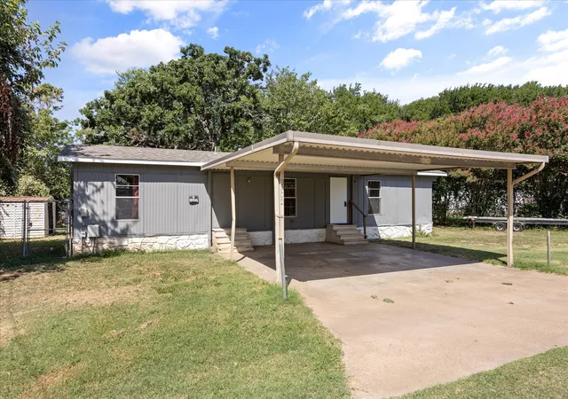 Photo 2 of Manufactured home for sale at 3702 Hartwood Dr, Granbury, TX 76049 | MLS# 21307363 | Listing updated on 2026-09-09