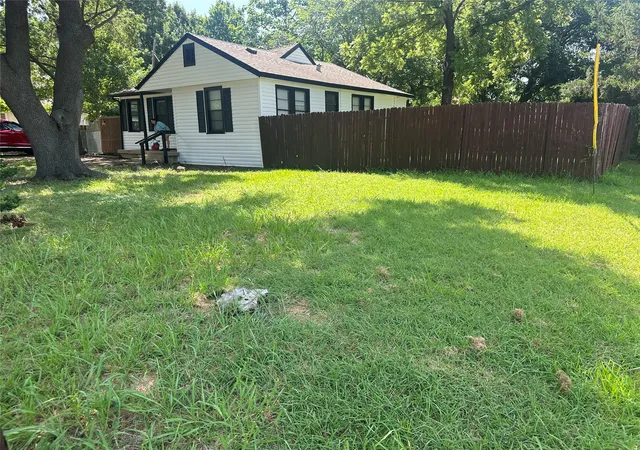 Photo 2 of Single family home for sale at 1602 Bruce Dr, Garland, TX 75043 | MLS# 21314935 | Listing updated on 2026-10-01