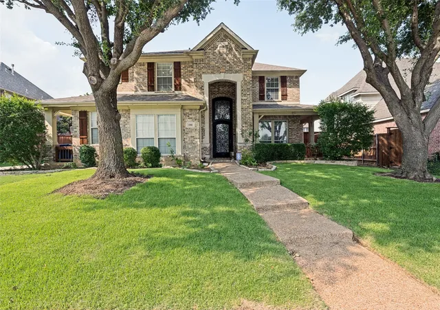 Photo 1 of Single family home for sale at 1700 Coyote Rdg, Carrollton, TX 75010 | MLS# 21316884 | Listing updated on 2026-09-08