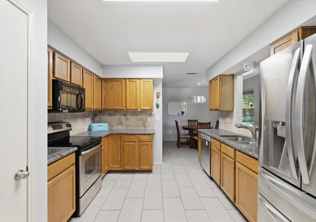 Photo 4 of Sale Pending at 1017 Spicewood Dr, Plano, TX 75025 | MLS# 21318482 | Listing updated on 2026-09-13