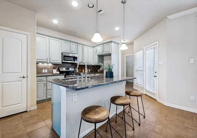 Photo 4 of Townhouse for sale at 4916 Empire Wy, Irving, TX 75038 | MLS# 21324254 | Listing updated on 2026-09-07