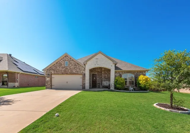Photo 2 of Single family home for sale at 704 Carmen Ana Ave, Grandview, TX 76050 | MLS# 21326140 | Listing updated on 2026-09-15