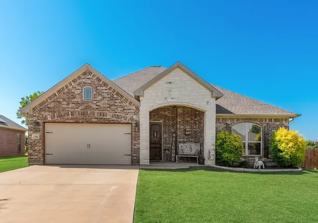 Photo 3 of Single family home for sale at 704 Carmen Ana Ave, Grandview, TX 76050 | MLS# 21326140 | Listing updated on 2026-09-15