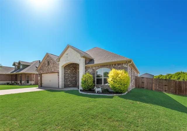 Photo 3 of Single family home for sale at 704 Carmen Ana Ave, Grandview, TX 76050 | MLS# 21326140 | Listing updated on 2026-09-15