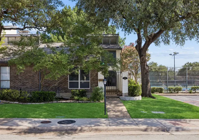 Photo 1 of Townhouse for sale at 9149 Emberglow Ln, Dallas, TX 75243 | MLS# 21322214 | Listing updated on 2026-09-11