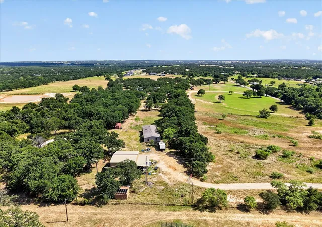 Photo 2 of Sale Pending at 1898 Russell Bend Rd, Weatherford, TX 76088 | MLS# 21328203 | Listing updated on 2026-09-10