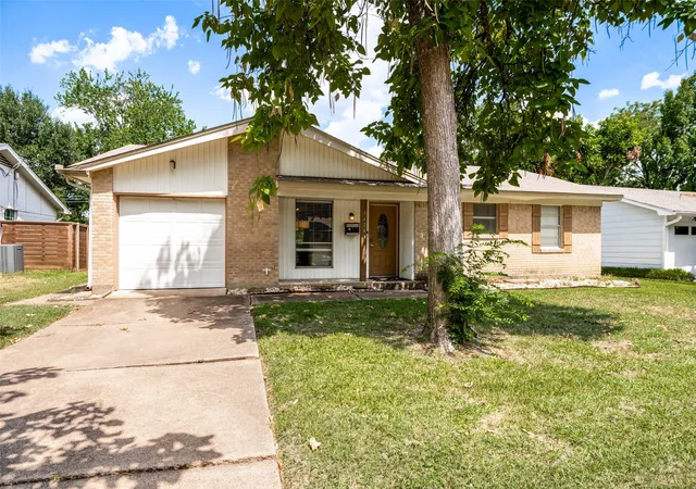 Photo 1 of Single family home for sale at 1404 Timberlake Cir, Richardson, TX 75080 | MLS# 21328346 | Listing updated on 2026-09-08