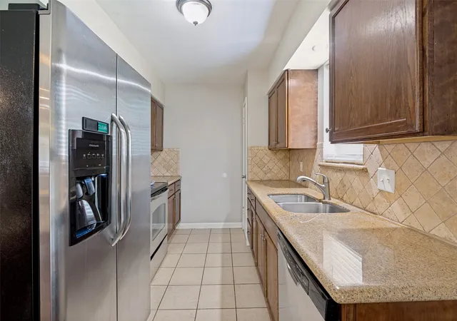 Photo 4 of Single family home for sale at 1404 Timberlake Cir, Richardson, TX 75080 | MLS# 21328346 | Listing updated on 2026-09-08