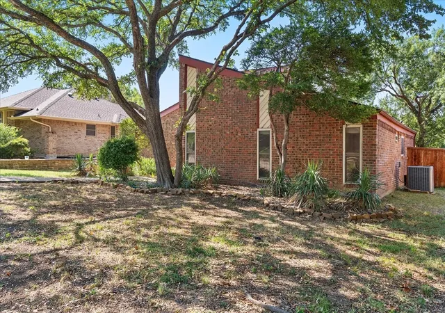 Photo 2 of Single family home for sale at 1820 Green Ridge Ct, Carrollton, TX 75007 | MLS# 21328075 | Listing updated on 2026-09-10