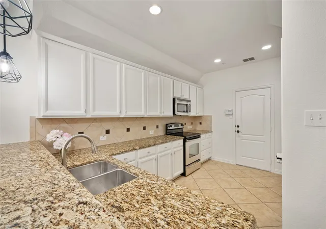 Photo 4 of Townhouse for sale at 2661 Jacobson Dr, Lewisville, TX 75067 | MLS# 21326850 | Listing updated on 2026-09-14