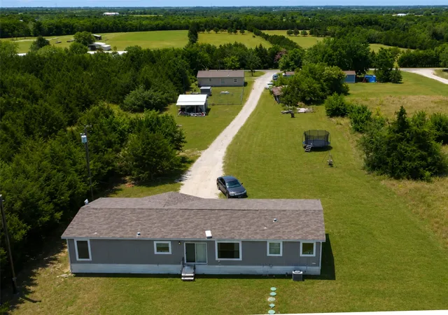 Photo 2 of Manufactured home for sale at 815 County Road 655, Farmersville, TX 75442 | MLS# 21325872 | Listing updated on 2026-09-14