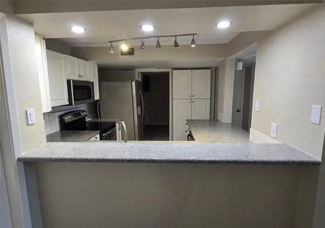 Photo 4 of Condo for sale at 11480 Audelia Rd #142, Dallas, TX 75243 | MLS# 21328675 | Listing updated on 2026-09-11