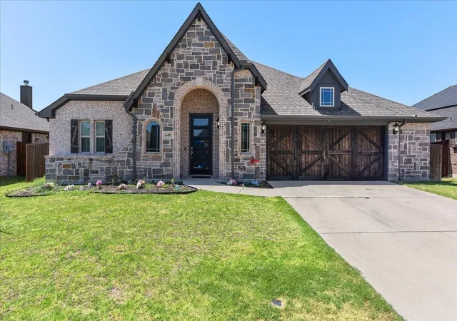 Photo 1 of Single family home for sale at 648 Sirius Ln, Waxahachie, TX 75165 | MLS# 21329811 | Listing updated on 2026-07-29