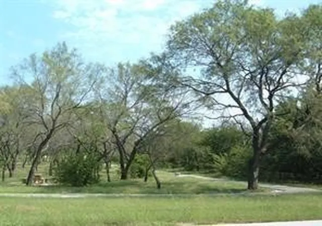 Photo 1 of Land for sale at Unit 5 Cimarron Trl, Runaway Bay, TX 76426 | MLS# 21330931 | Listing updated on 2026-09-09