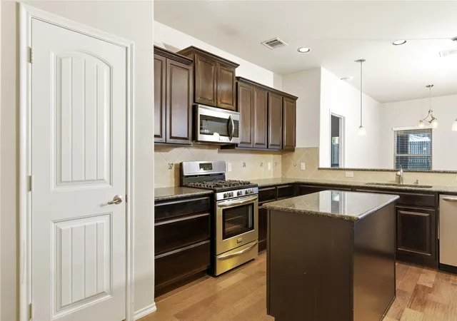 Photo 3 of Single family home for sale at 945 Lake Woodland Dr, Little Elm, TX 75068 | MLS# 21294927 | Listing updated on 2026-09-14