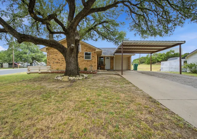 Photo 2 of Single family home for sale at 701 Van Winkle St, Weatherford, TX 76086 | MLS# 21330919 | Listing updated on 2026-09-11