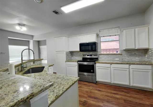 Photo 2 of Single family home for sale at 3613 Stockton Dr, Carrollton, TX 75010 | MLS# 21333220 | Listing updated on 2026-09-09