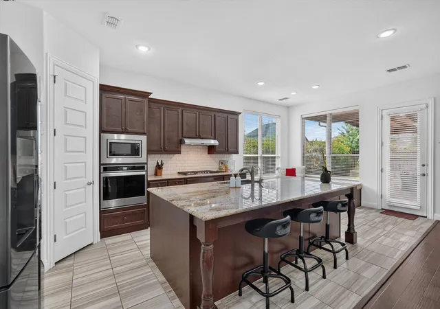 Photo 3 of Single family home for sale at 13762 Kevin Dr, Frisco, TX 75035 | MLS# 21334353 | Listing updated on 2026-10-03