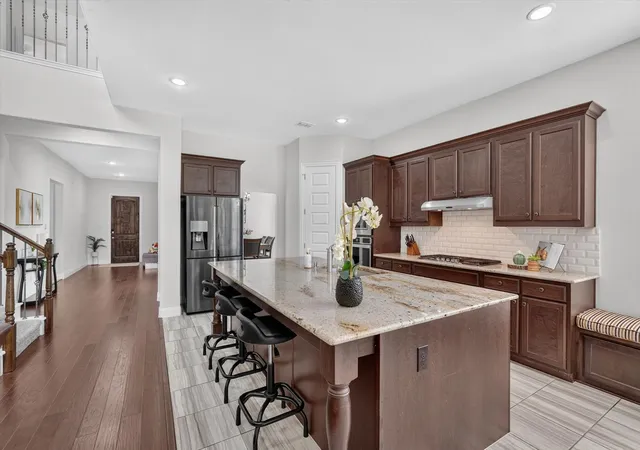 Photo 3 of Single family home for sale at 13762 Kevin Dr, Frisco, TX 75035 | MLS# 21334353 | Listing updated on 2026-10-03