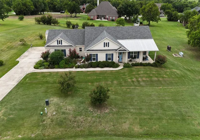 Photo 2 of Sale Pending at 131 Whispering Winds Dr, Gunter, TX 75058 | MLS# 21330846 | Listing updated on 2026-09-29