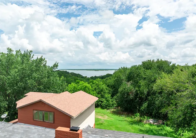 Photo 3 of Single family home for sale at 105 Texoma Terrace Rd, Denison, TX 75020 | MLS# 21326264 | Listing updated on 2026-09-08