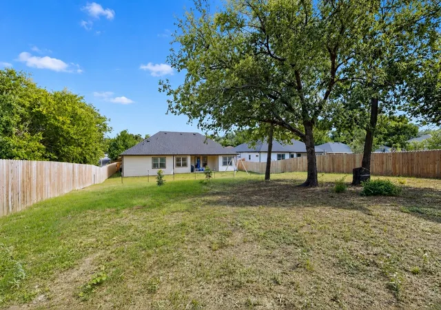 Photo 3 of Single family home for sale at 821 E 2nd St, Weatherford, TX 76086 | MLS# 21334556 | Listing updated on 2026-09-11