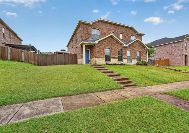 Photo 1 of Single family home for sale at 1933 Timber Oaks Dr, Garland, TX 75040 | MLS# 21336819 | Listing updated on 2026-09-11