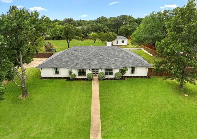 Photo 1 of Sale Pending at 180 Trailing Oaks Dr, Double Oak, TX 75077 | MLS# 21318511 | Listing updated on 2026-09-15