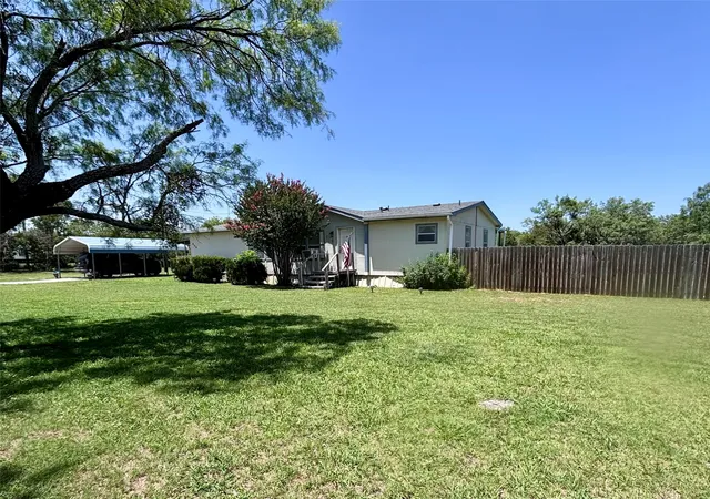 Photo 2 of Manufactured home for sale at 606 W 16th St, Cisco, TX 76437 | MLS# 21339078 | Listing updated on 2026-08-31
