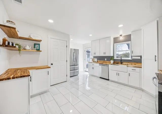 Photo 2 of Single family home for sale at 207 Joe White St, Rockwall, TX 75087 | MLS# 21336368 | Listing updated on 2026-09-13