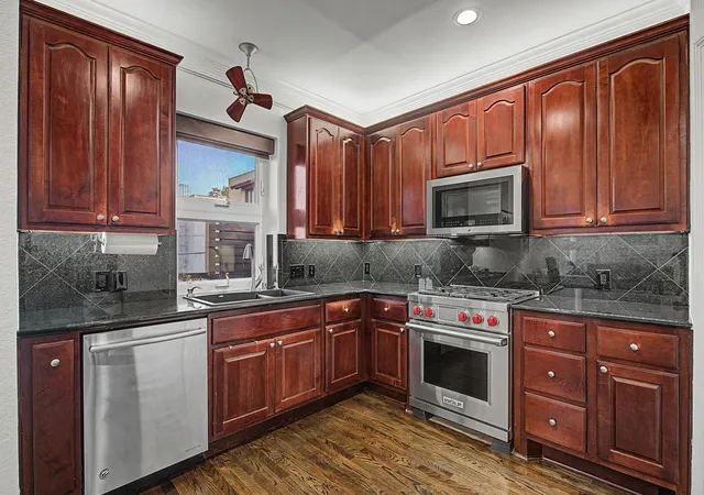 Photo 4 of Townhouse for sale at 4415 Holland Ave #D, Dallas, TX 75219 | MLS# 21339367 | Listing updated on 2026-09-14