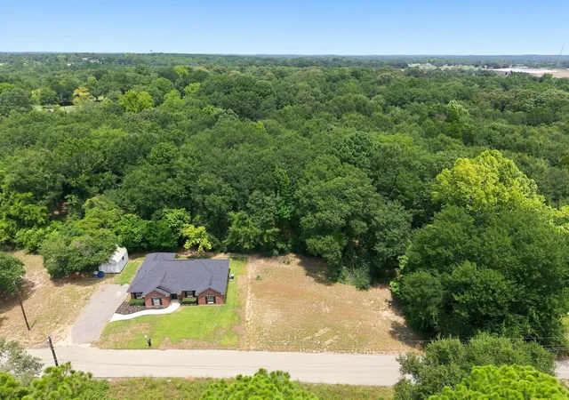 Photo 2 of Single family home for sale at 105 E Foggle St, Athens, TX 75751 | MLS# 21340693 | Listing updated on 2026-09-14