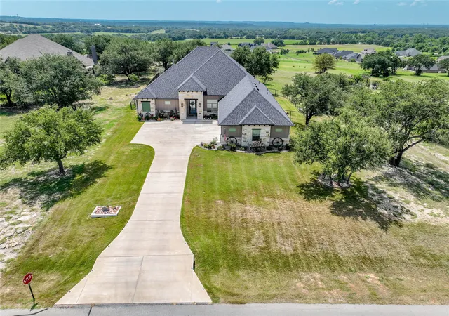 Photo 2 of Single family home for sale at 8021 White Dr, Granbury, TX 76049 | MLS# 21343351 | Listing updated on 2026-10-02