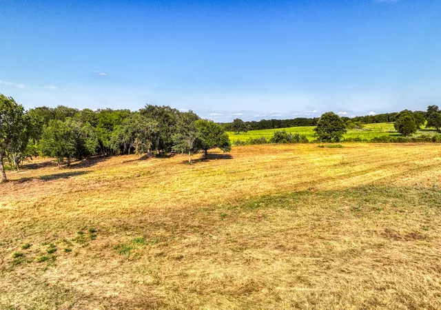 Photo 2 of Land for sale at Lot 34 Three Quarter Loop, Poolville, TX 76487 | MLS# 21343541 | Listing updated on 2026-07-29