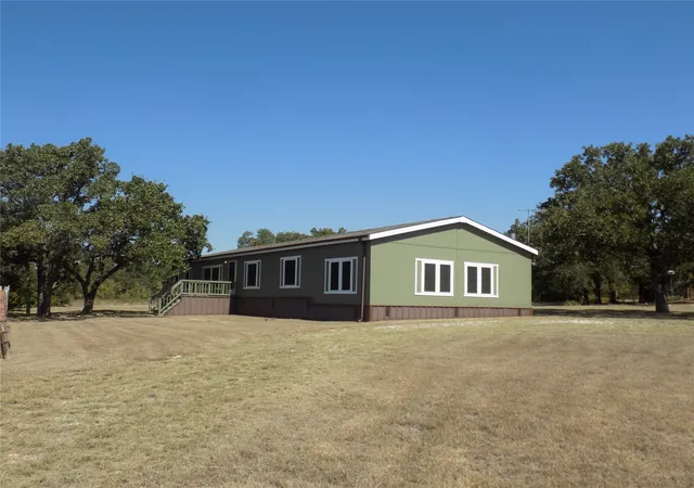 Photo 1 of Manufactured home for sale at 12792 W Hwy 199, Poolville, TX 76487 | MLS# 21341071 | Listing updated on 2026-07-30