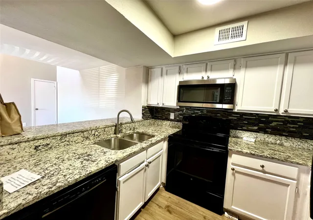 Listing Photo 5 - Condo for sale in building located at 9807 Walnut St, Dallas, TX 75243 - Unit #201