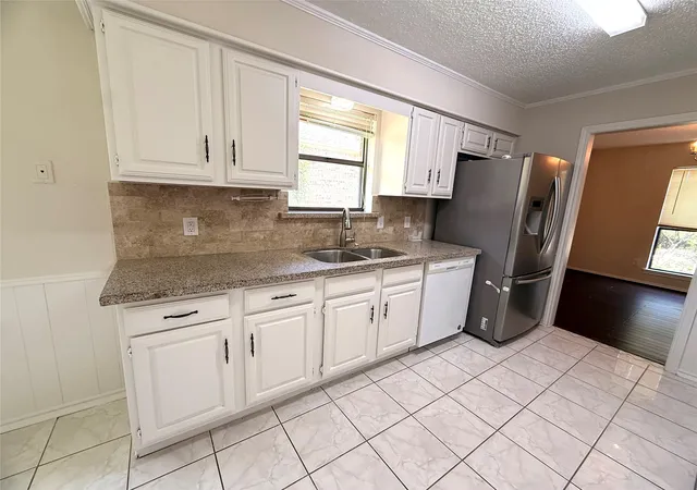 Photo 3 of Single family home for sale at 1603 E Peters Colony Rd, Carrollton, TX 75007 | MLS# 21344865 | Listing updated on 2026-07-30