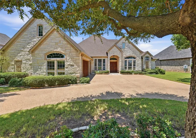 Photo 1 of Single family home for sale at 2703 Waters Edge Dr, Granbury, TX 76048 | MLS# 21345118 | Listing updated on 2026-10-04