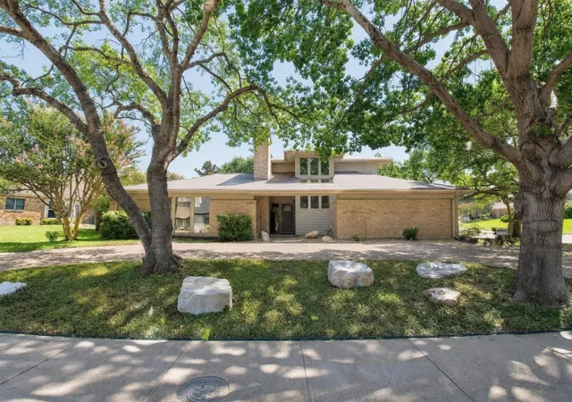Photo 1 of Single family home for sale at 11901 Woodbridge Dr, Dallas, TX 75243 | MLS# 21345041 | Listing updated on 2026-09-30