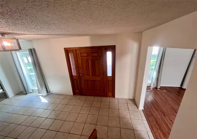 Photo 3 of Single family home for sale at 7410 Boisenberry Ln, Dallas, TX 75249 | MLS# 21346924 | Listing updated on 2026-10-05