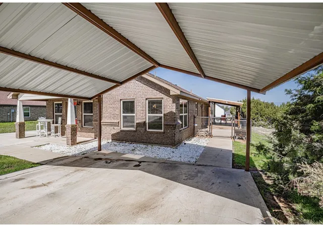 Photo 3 of Sale Pending at 2302 San Saba Ct, Granbury, TX 76048 | MLS# 21348443 | Listing updated on 2026-10-01