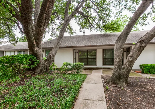 Photo 1 of Townhouse for sale at 13719 Flagstone Ln, Dallas, TX 75240 | MLS# 21350133 | Listing updated on 2026-09-17