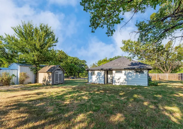 Photo 3 of Single family home for sale at 310 North Rd, Kennedale, TX 76060 | MLS# 21352262 | Listing updated on 2026-09-11