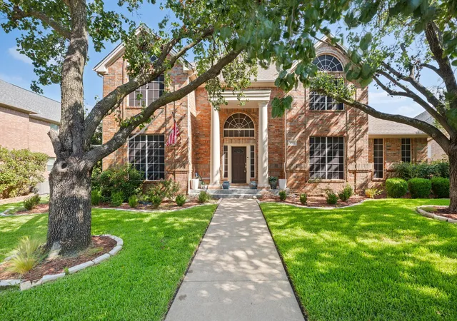 Photo 1 of Single family home for sale at 2311 Creekside Cir N, Irving, TX 75063 | MLS# 21348469 | Listing updated on 2026-09-10