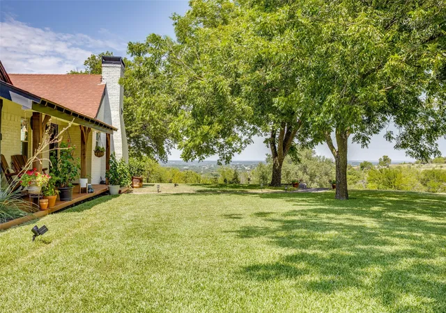 Photo 3 of Single family home for sale at 13800 Llano Dr, Weatherford, TX 76087 | MLS# 21337145 | Listing updated on 2026-10-03