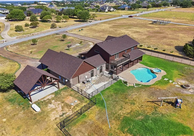 Photo 3 of Single family home for sale at 2407 Wills Way Dr, Granbury, TX 76049 | MLS# 21351686 | Listing updated on 2026-09-10