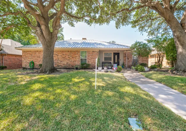 Photo 1 of Single family home for sale at 2006 E Branch Hollow Dr, Carrollton, TX 75007 | MLS# 21357234 | Listing updated on 2026-09-24