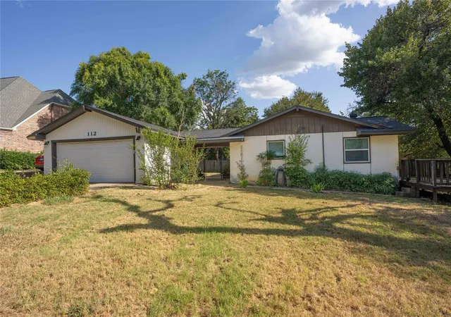Photo 1 of Single family home for sale at 112 Oaktree Dr, Lewisville, TX 75077 | MLS# 21357318 | Listing updated on 2026-09-11