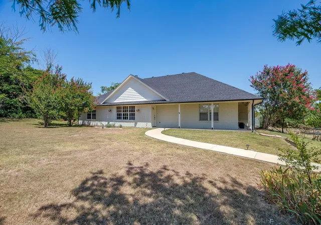 Photo 1 of Single family home for sale at 321 E Woody Creek Ct, Springtown, TX 76082 | MLS# 21354871 | Listing updated on 2026-09-09